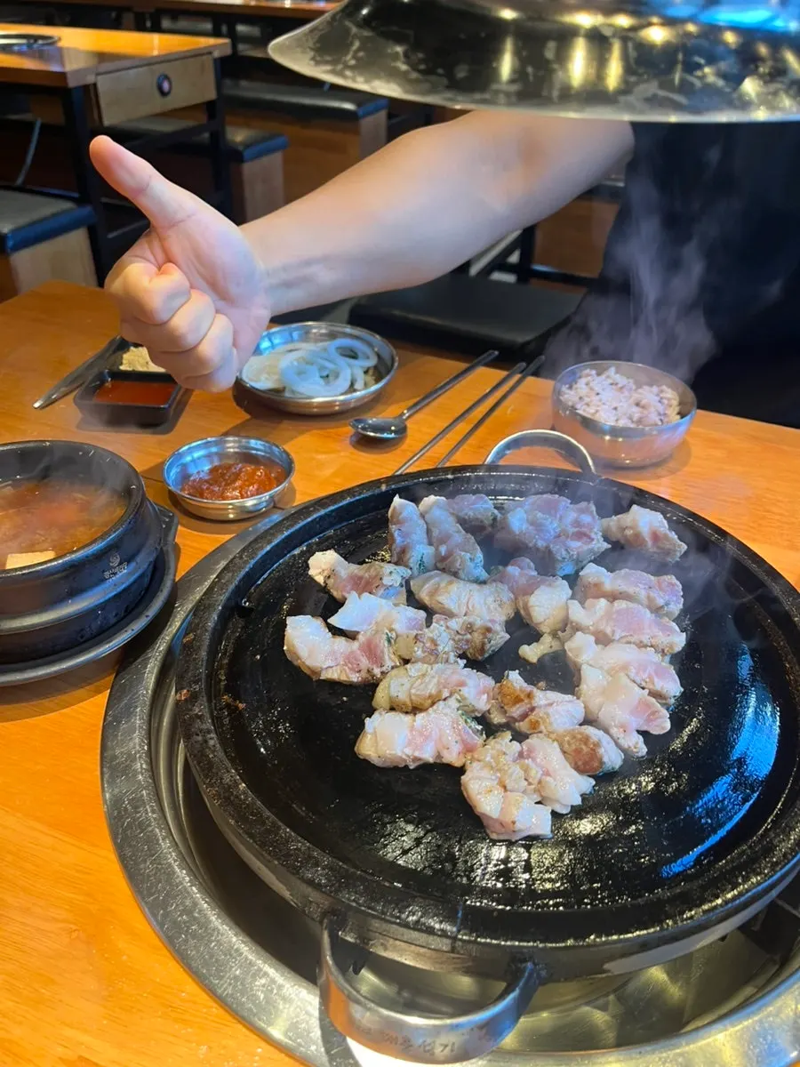 Pork belly grilling on the pan