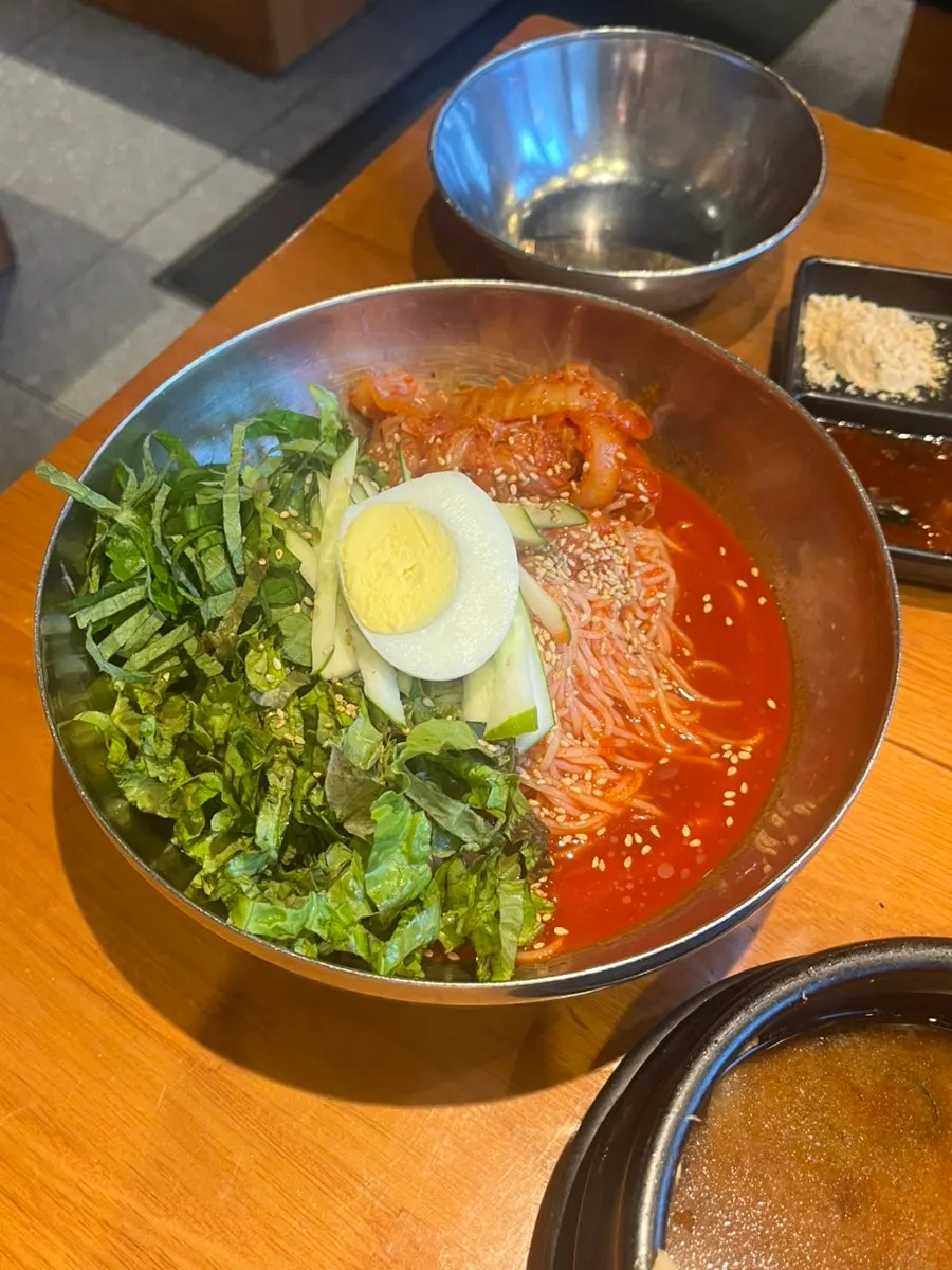 Bibim guksu ordered alongside the meat