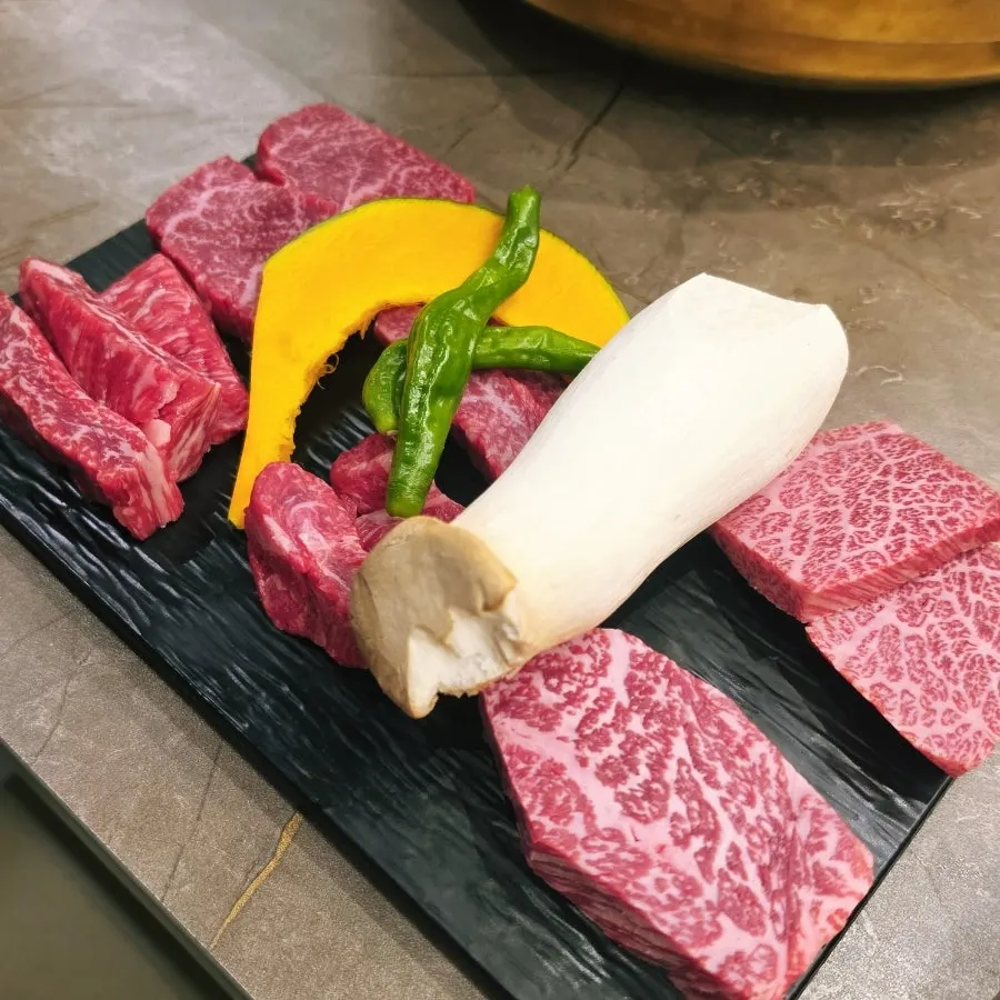 Two-person hanwoo assortment and doenjang sulbap table setting