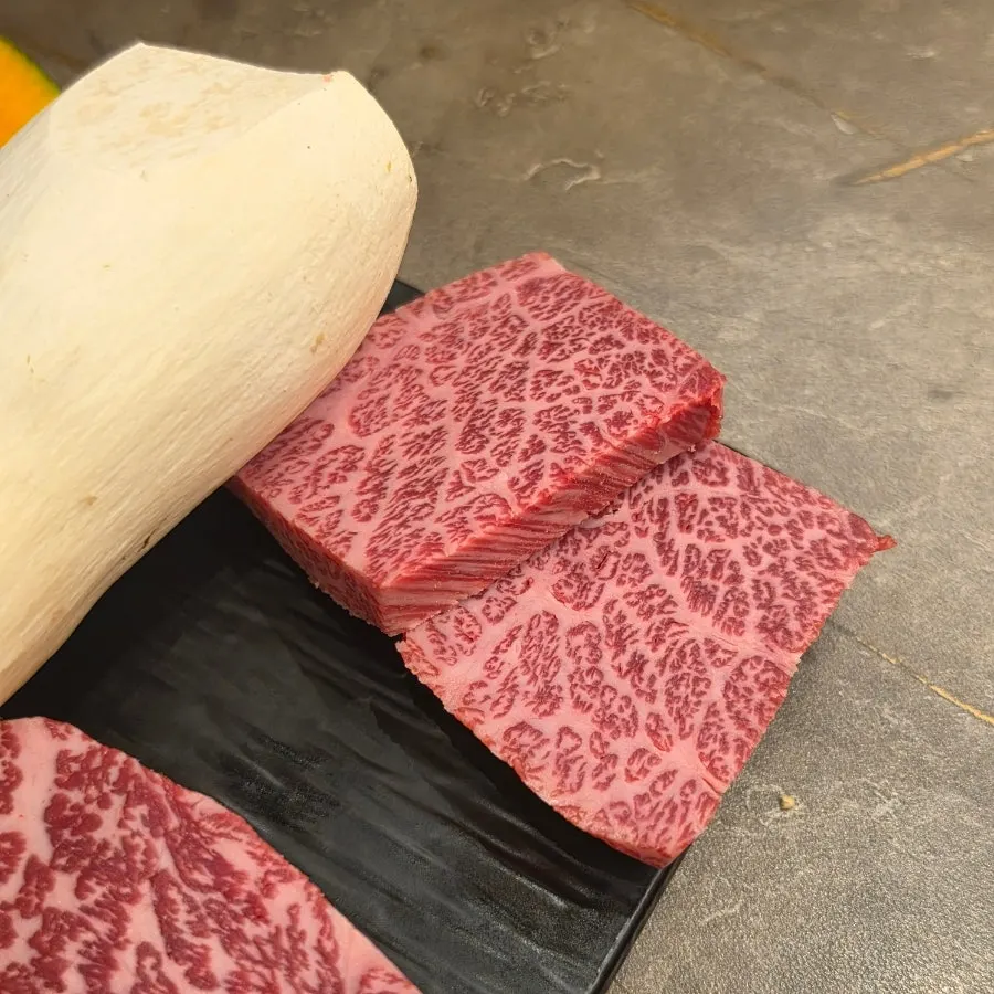 Preparing the hanwoo assortment for charcoal grilling