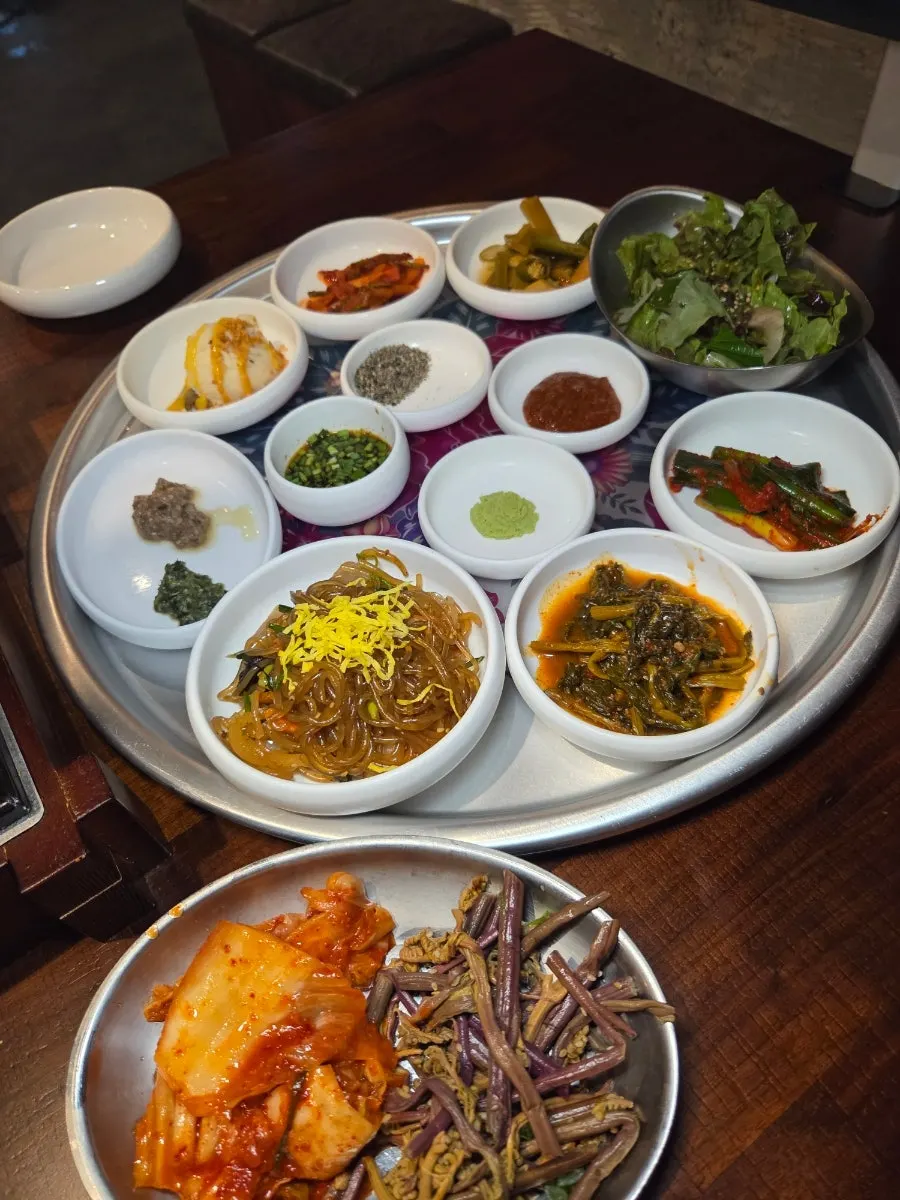 Korean beef cheonggukjang stew with a variety of side dishes
