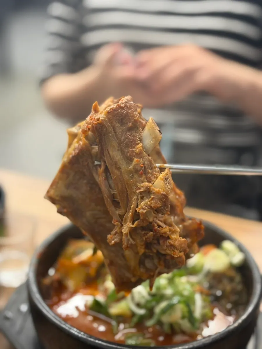 Pork bone with meat attached in pork bone hangover soup