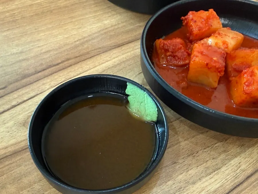 Wasabi mustard sauce with pork bone udon haejangguk