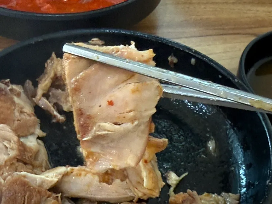 A bowl of pork bone haejangguk enjoyed with noodles