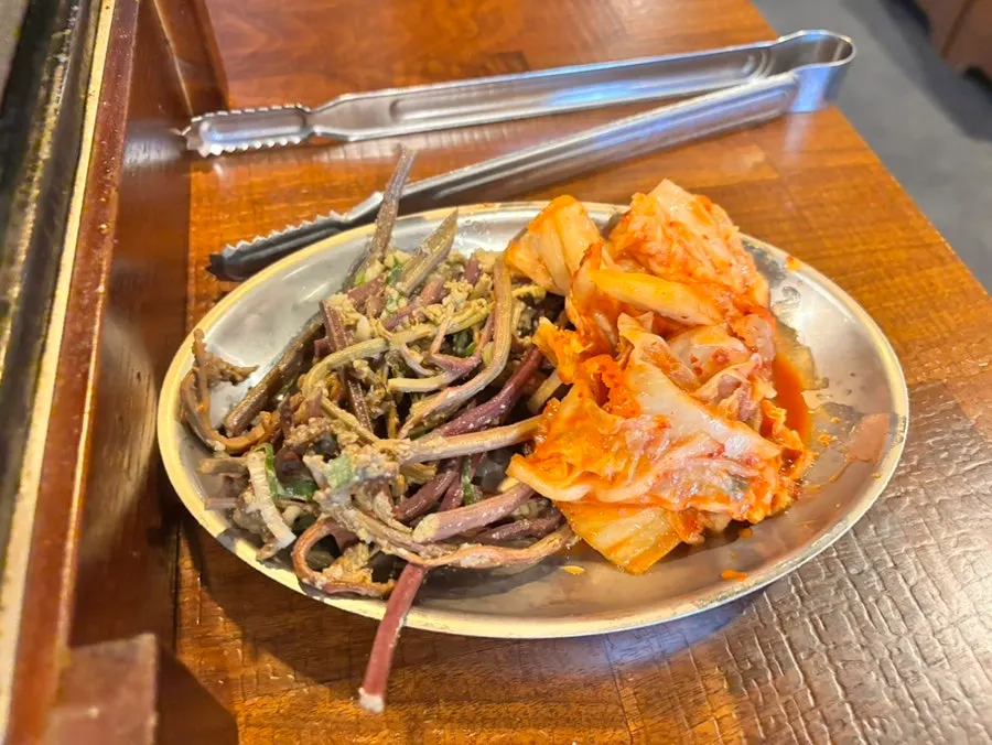 Bracken fern and kimchi to grill alongside the meat
