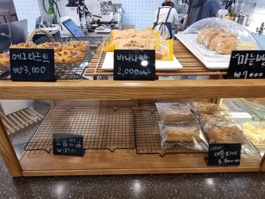 Butter rice cake and other desserts on display at Café Meomureum