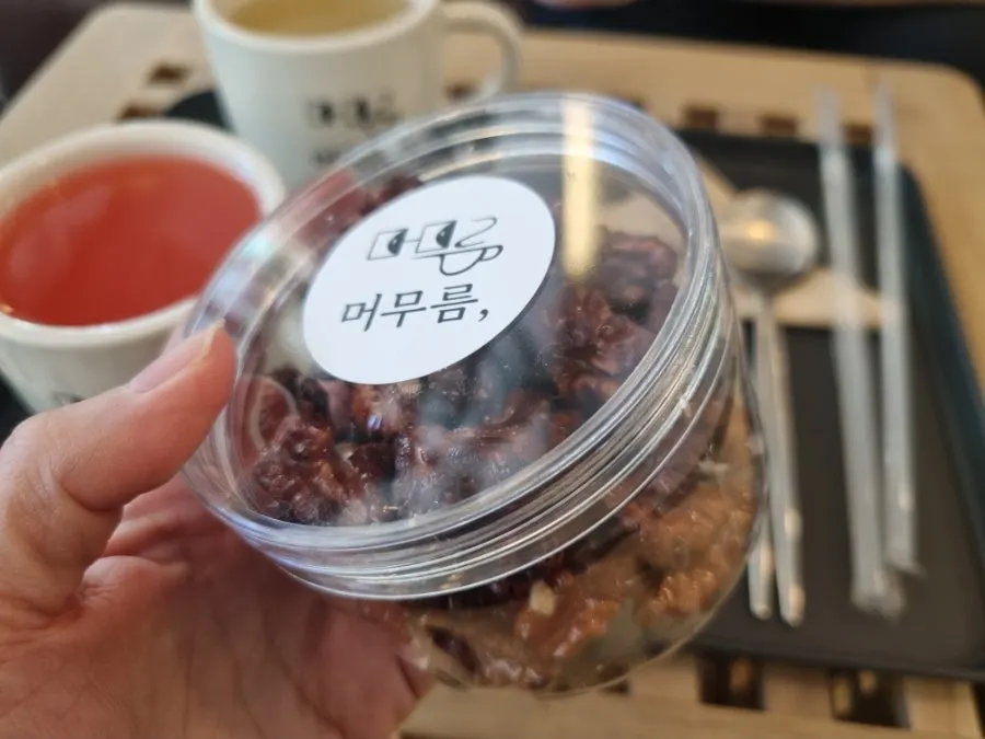 Warm yuja tea served with handmade walnut jeonggwa