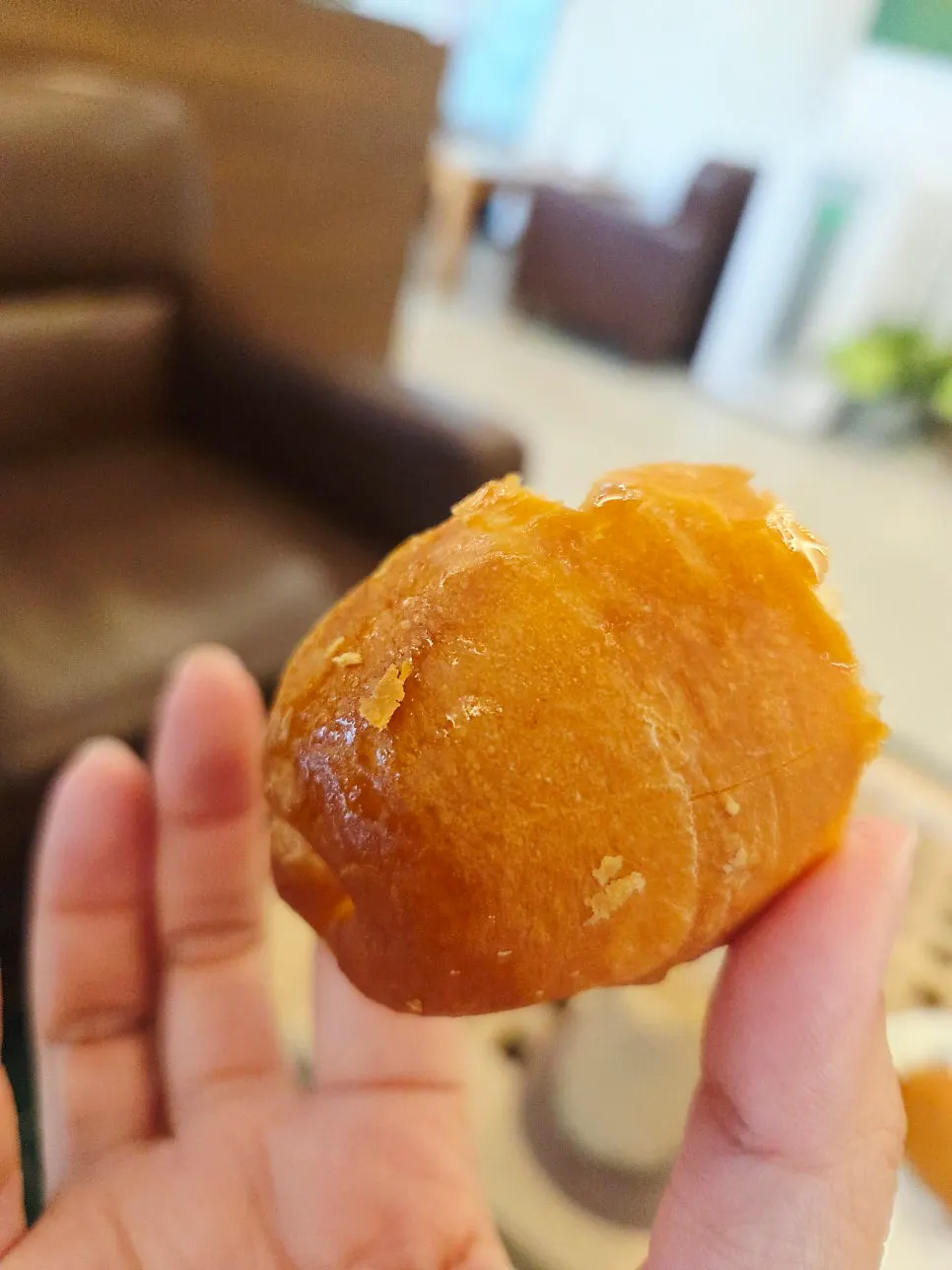 Holding a warm, crispy-outside salt bread