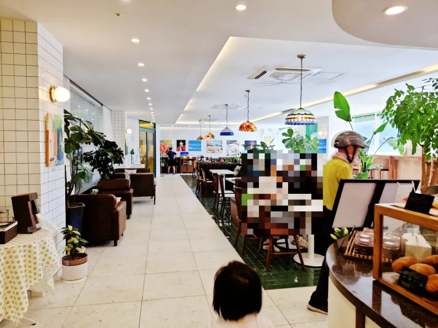 Spacious café interior with varied seating