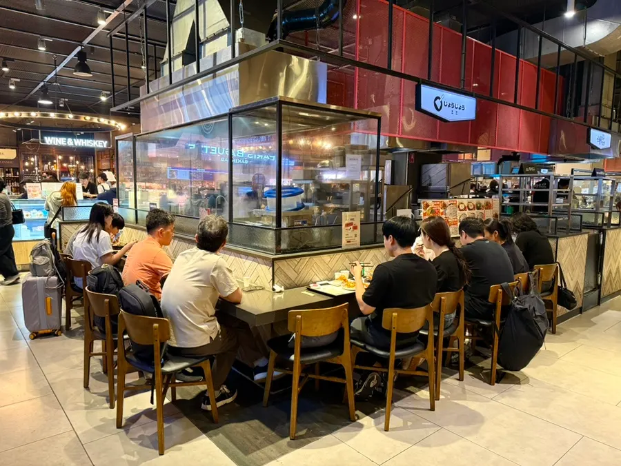 Bar table seating in front of Jojo