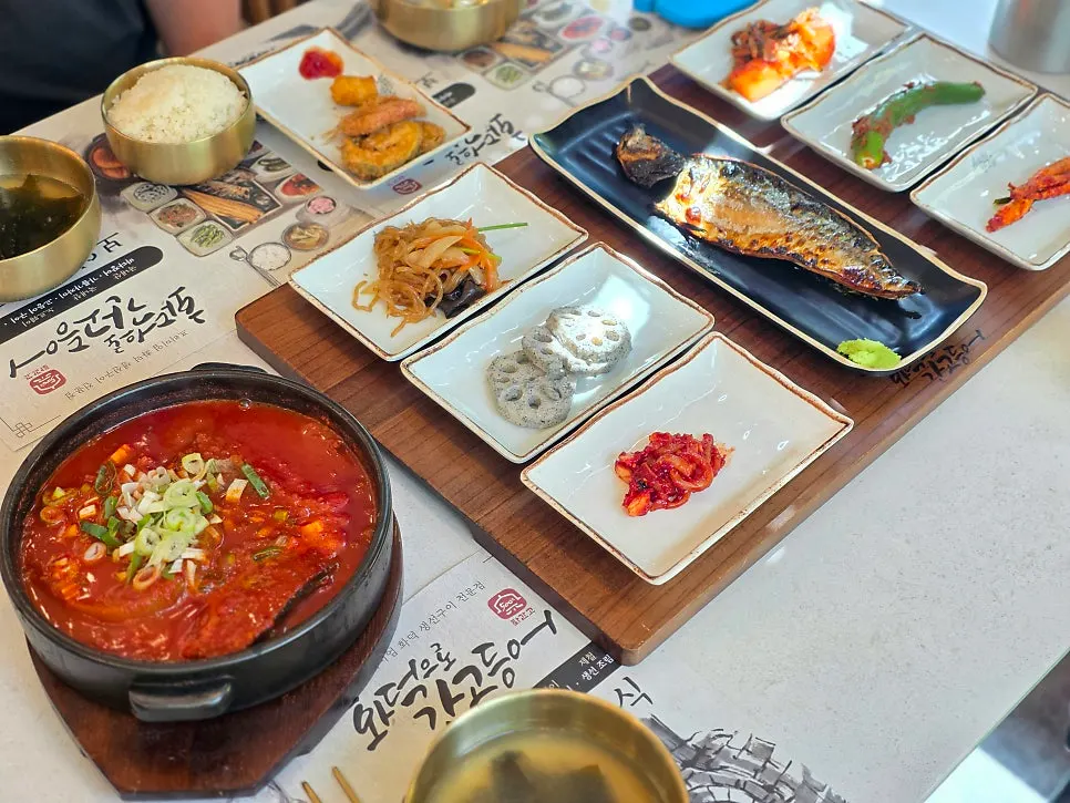 Two trays of the grilled mackerel set and braised mackerel with radish set