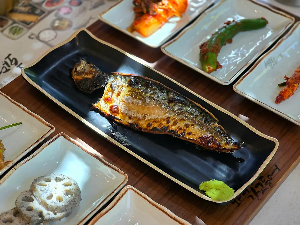 Plate of grilled mackerel fresh from the wood-fired oven