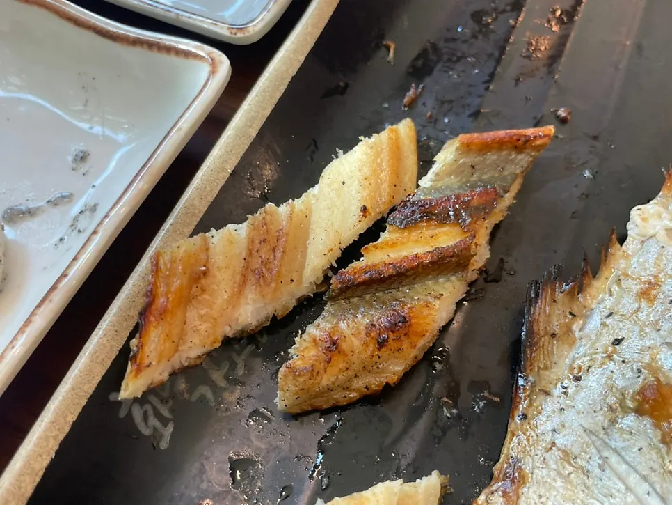 Wood-fired mackerel grilled crispy on the outside