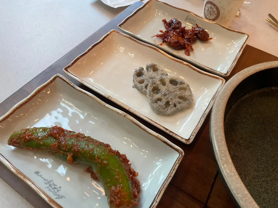 A bite of grilled fish with side dishes together