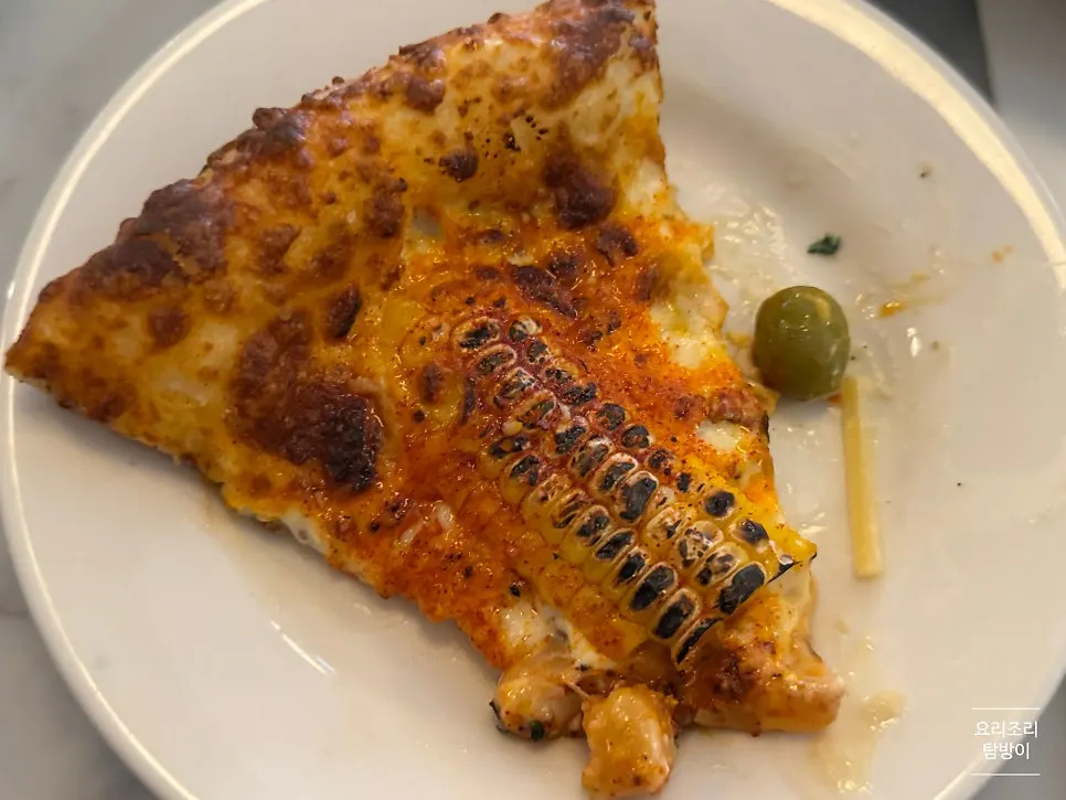 Pizza loaded with corn topping