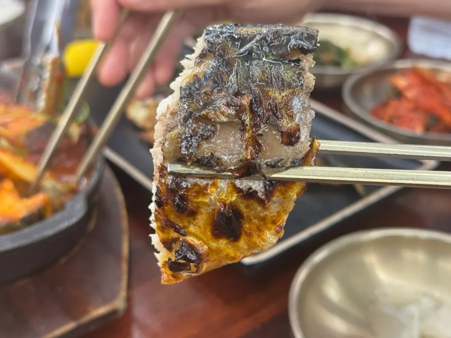 Grilled mackerel cut into easy-to-eat pieces
