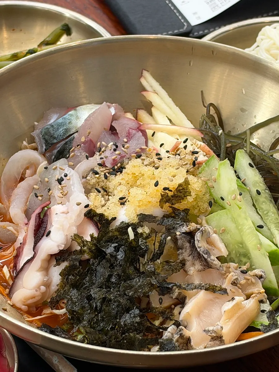 A thick piece of mackerel sushi