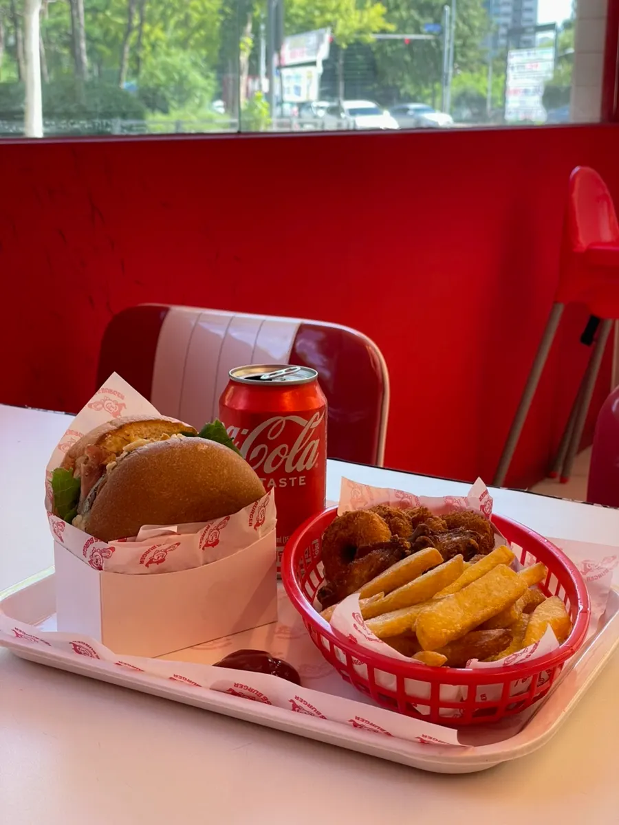 Handmade burger set placed by the window seat