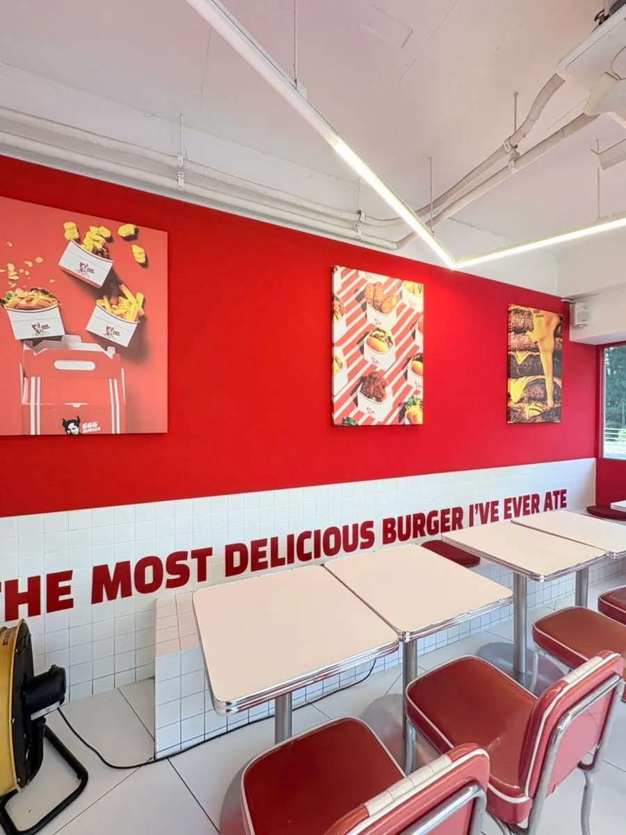 Interior and menu board at 666 Burger Main Branch