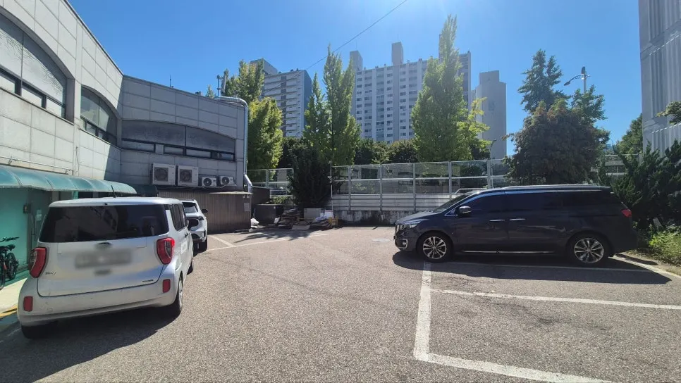 Shopping complex parking lot behind 666 Burger Main Branch