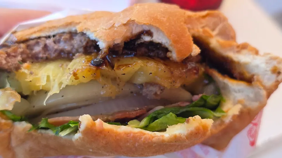 Close-up of a thick handmade burger patty
