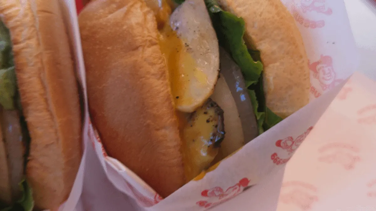 Signature handmade burger shot from 666 Burger Main Branch