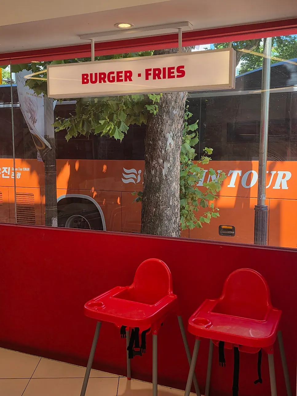 Table area inside 666 Burger Main Branch