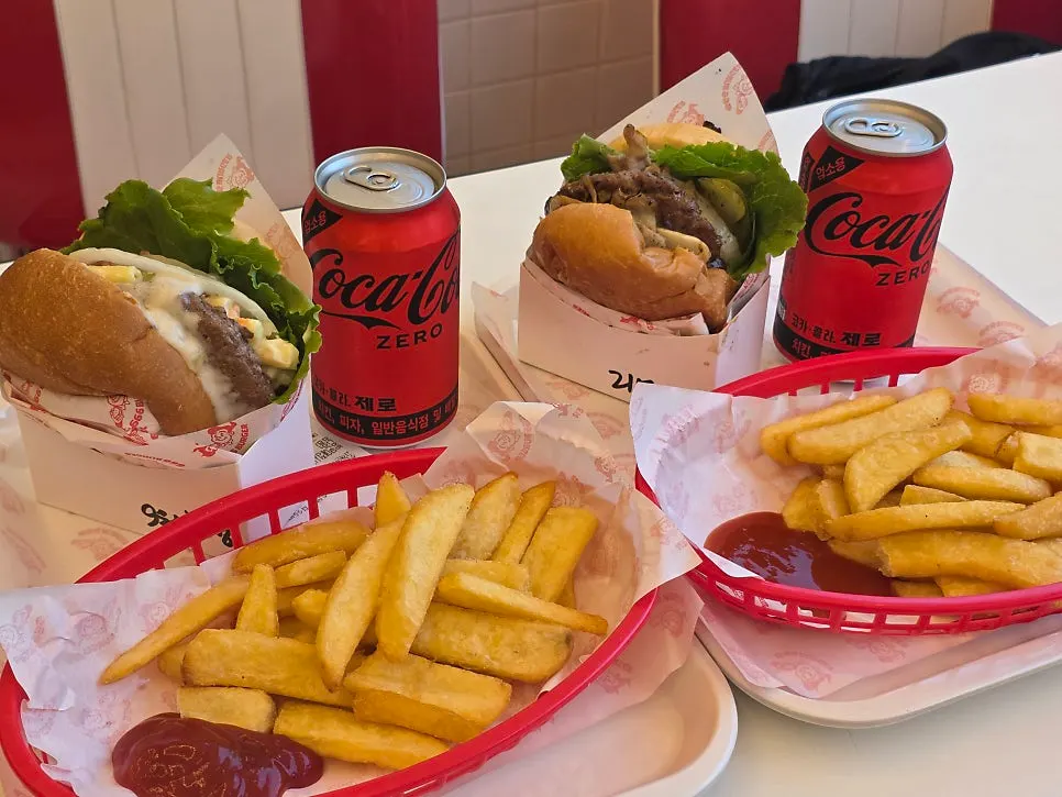 Two handmade burger sets served with fries