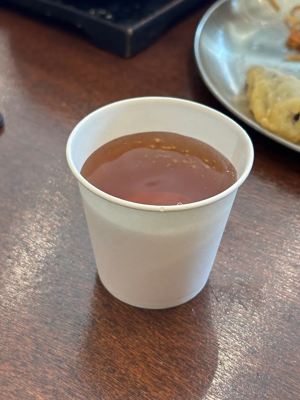 Dessert of rice puffs, barley crackers and plum juice