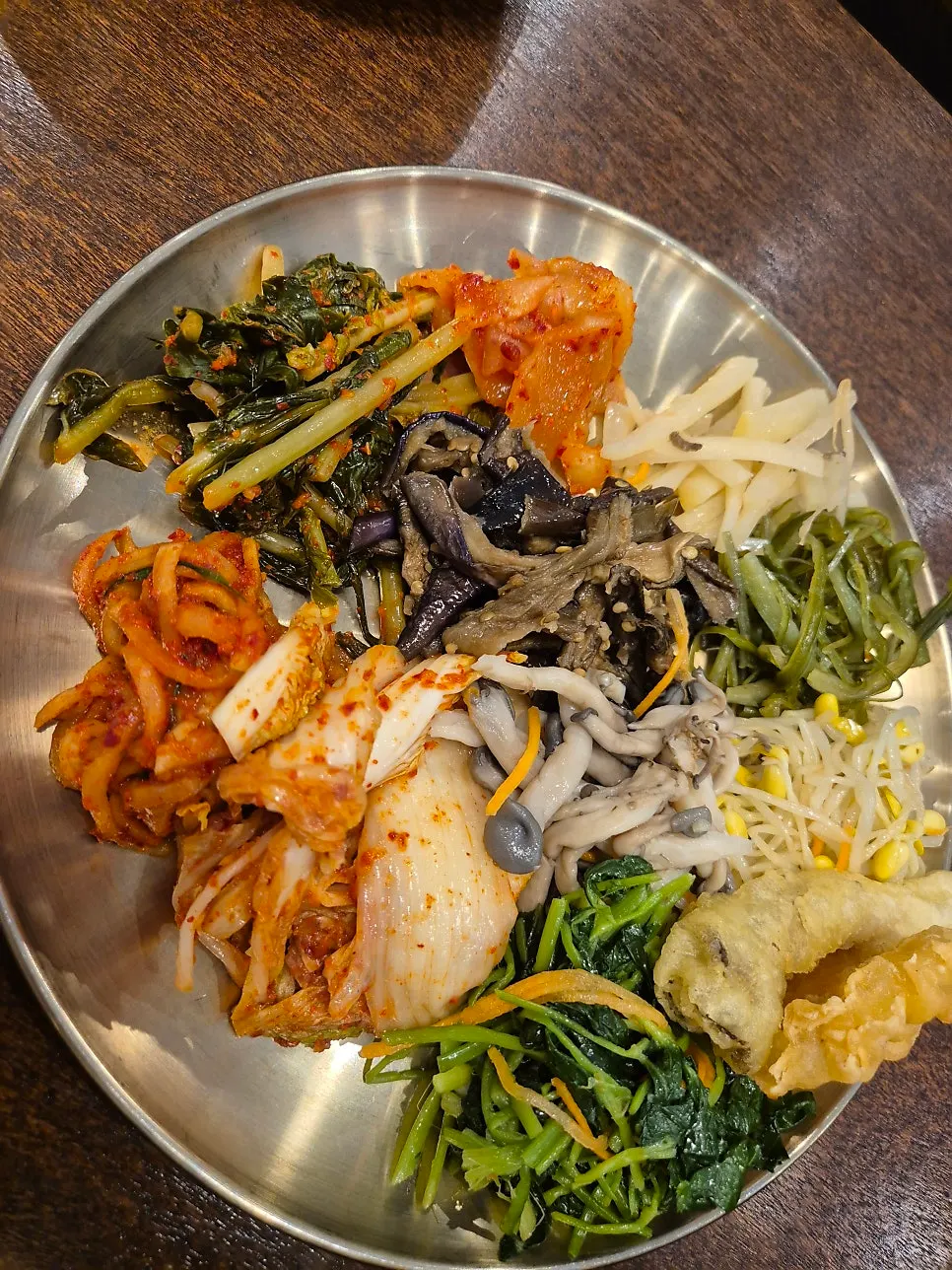 Plate filled with bibimbap ingredients