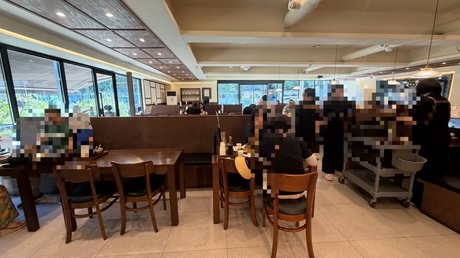Spacious dining hall at Boriook Main Branch with wide table gaps