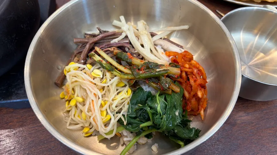 A table piled high with self-serve bar food