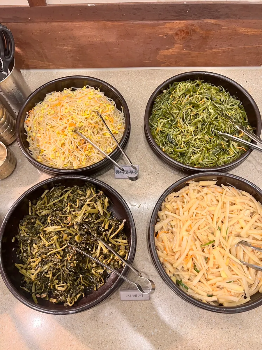 Cabbage wraps served alongside the barley rice