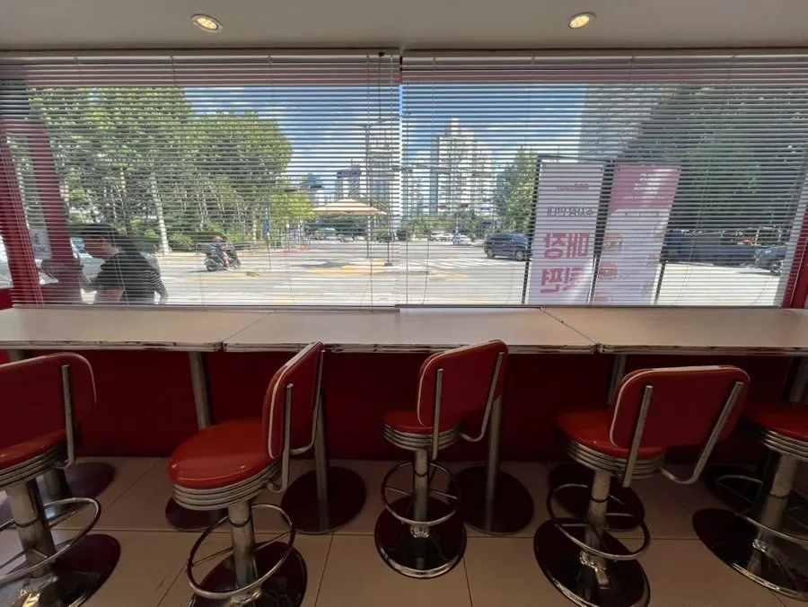 Kiosk ordering area at 666 Burger Main Branch