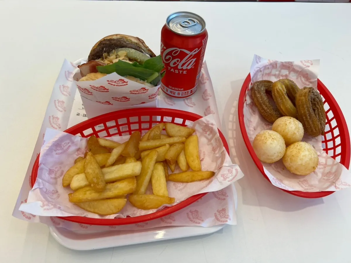 Garlic Boom set with churros and cheese balls at 666 Burger