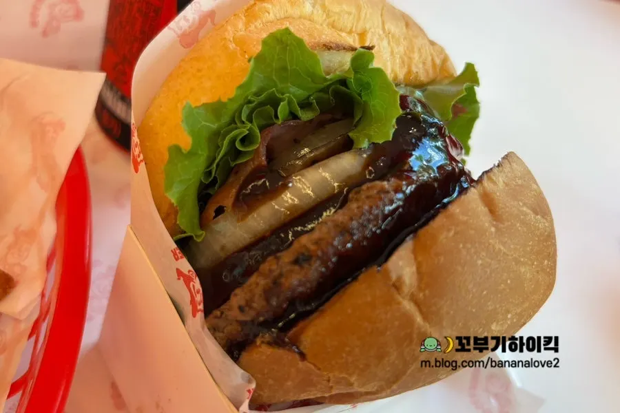 Grilled Hawaiian burger served in a box