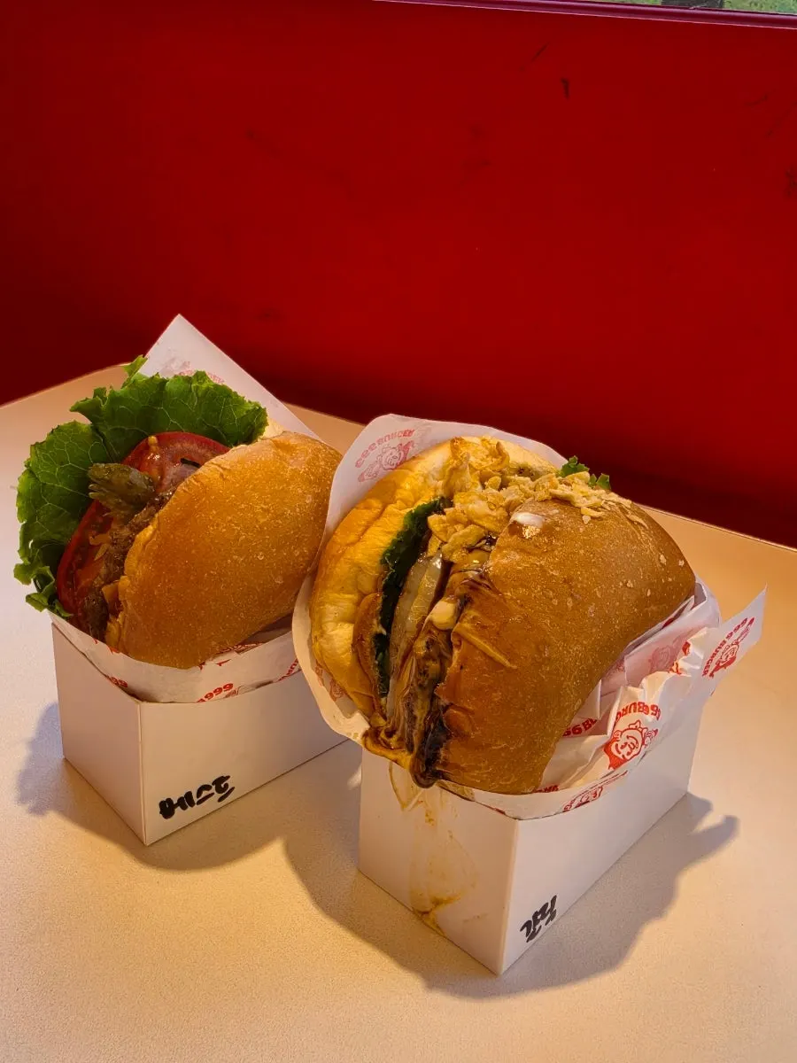 Two handmade burgers cooked fresh to order