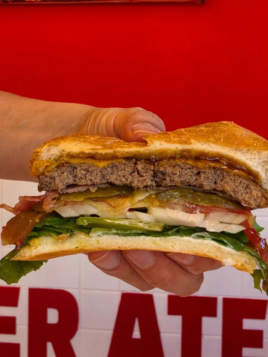 Best Position burger with a bite taken out