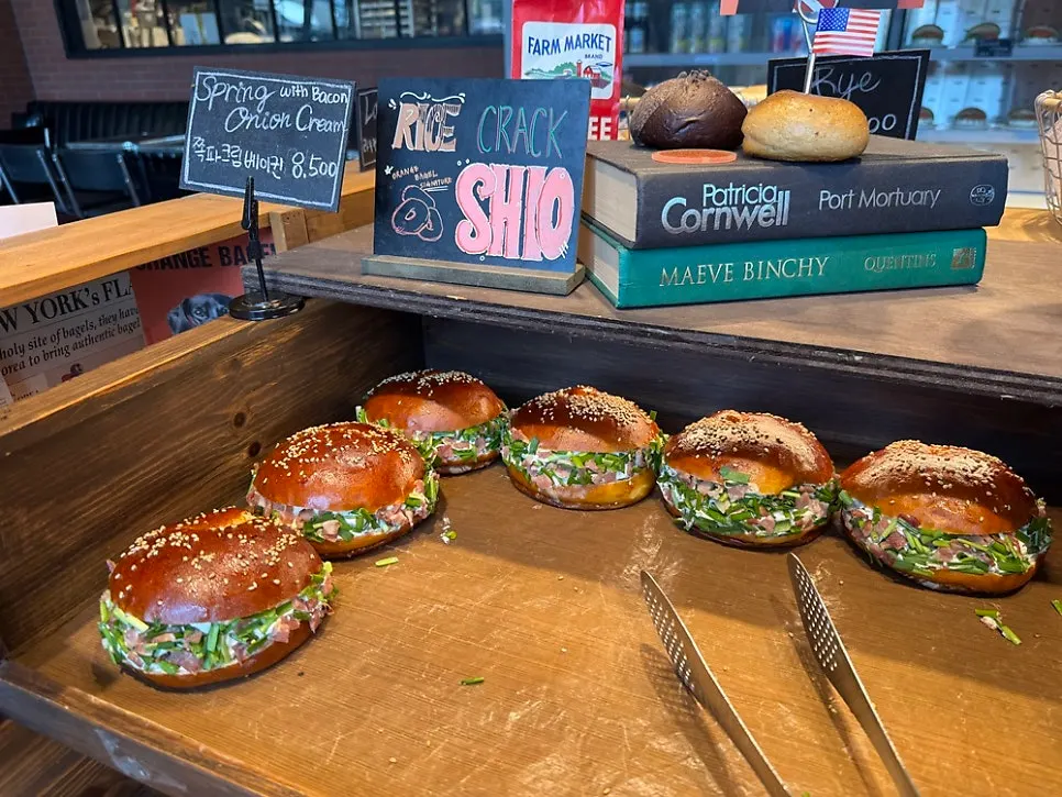 Scallion bacon bagels on the display shelf