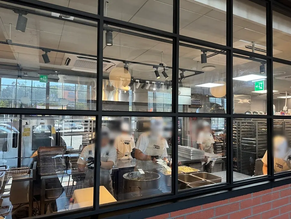 Bagels being made in the open kitchen