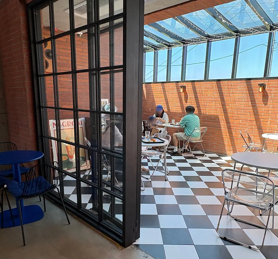 Second floor seating area at Orange Bagel
