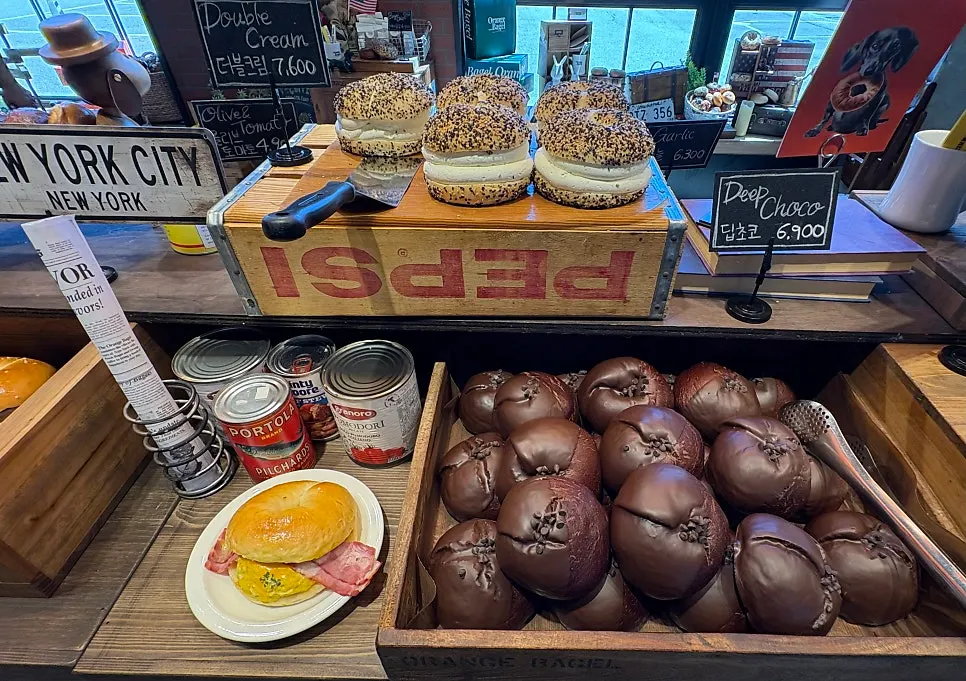 Bagel display case and the signature orange box
