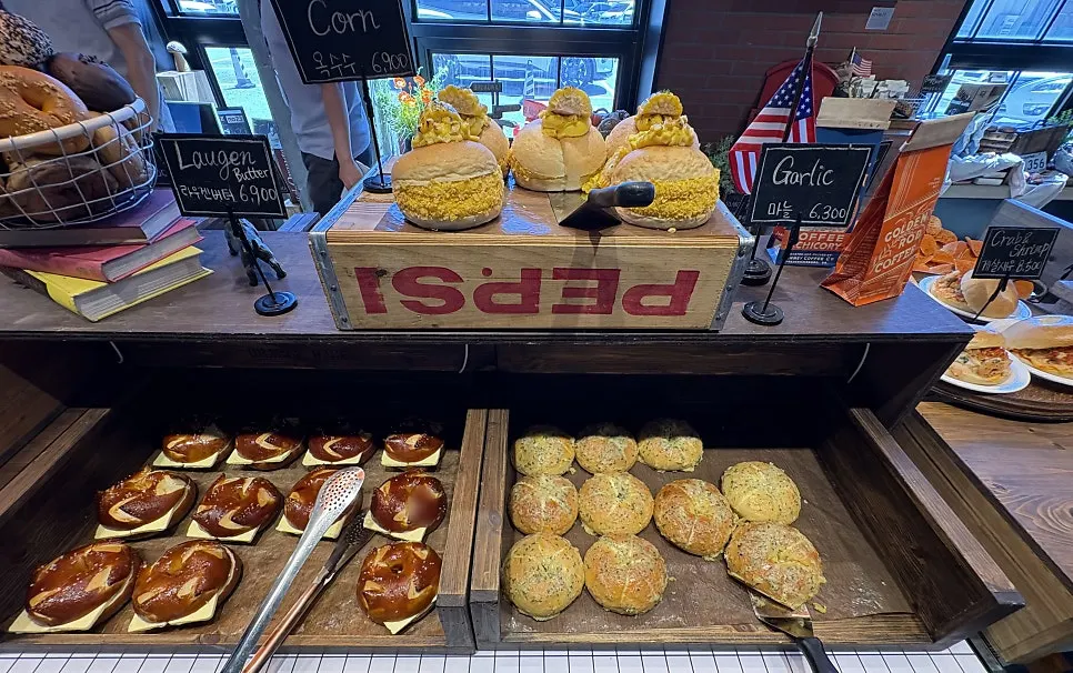 A variety of bagel flavors on the shelf