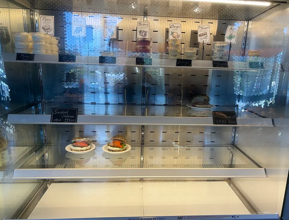 Close-up of the bagel display case