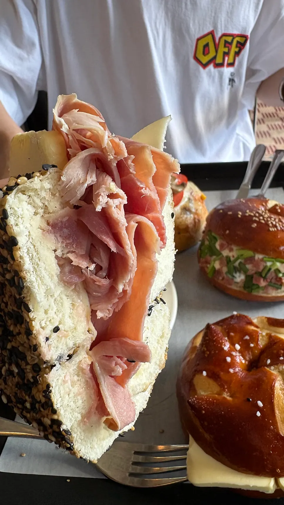 Interior of the large Orange Bagel café space
