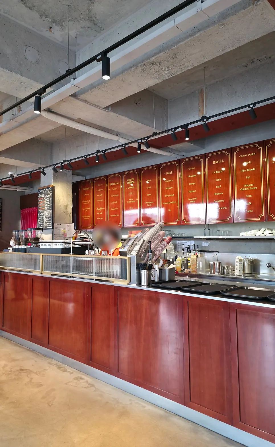 Café entrance with orange-toned wood interior