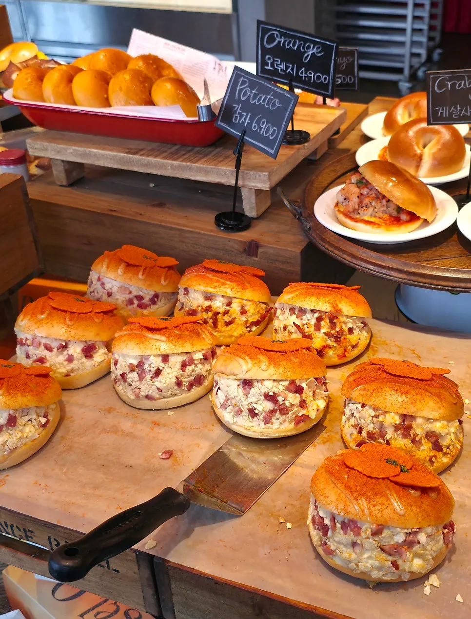 Scallion cream bacon and pepperoni bagels on display