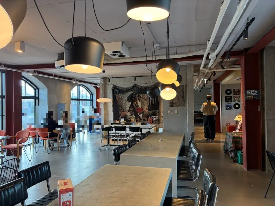 2nd-floor space with generously arranged tables