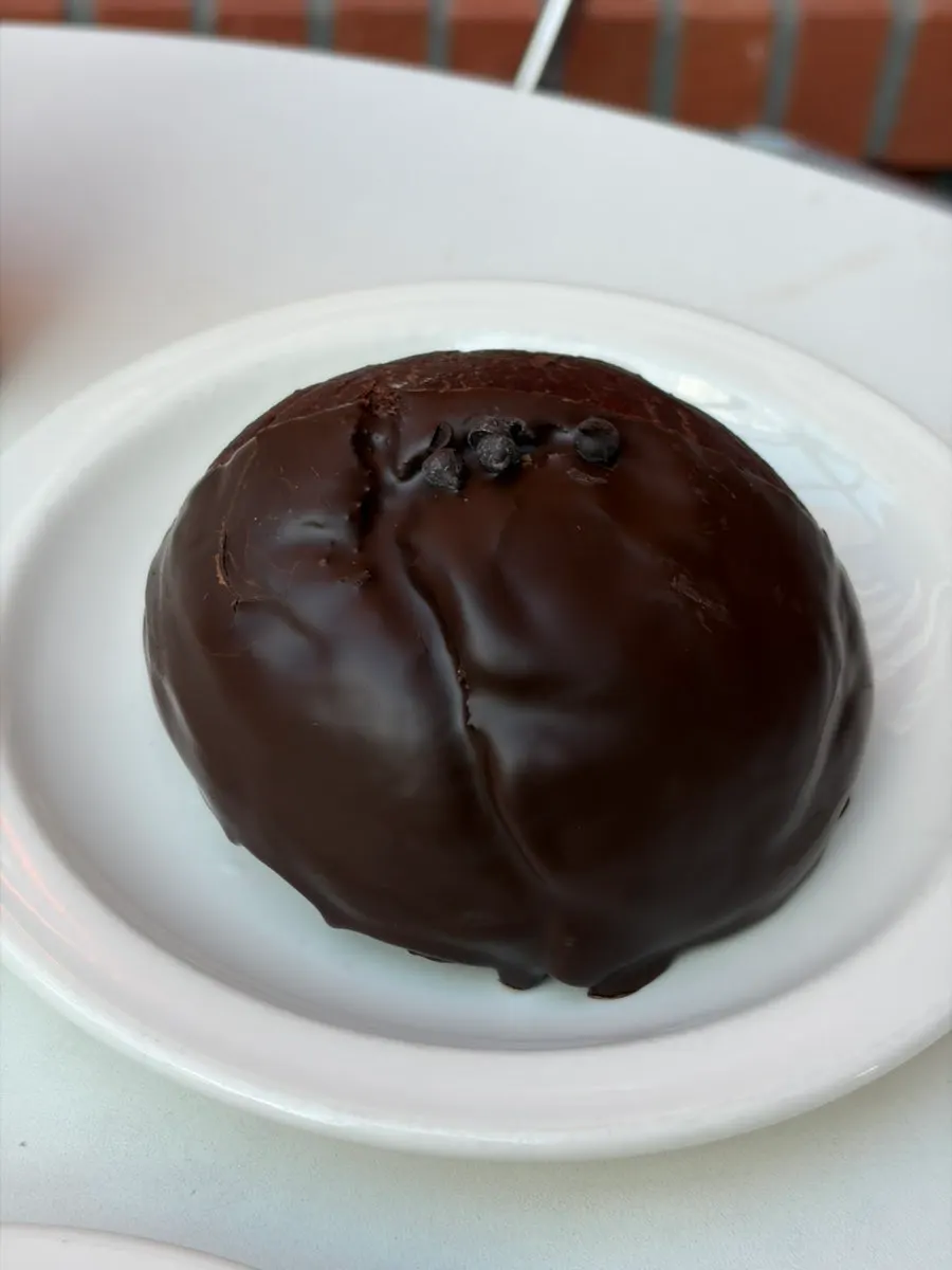 Chocolate bagel with a drink