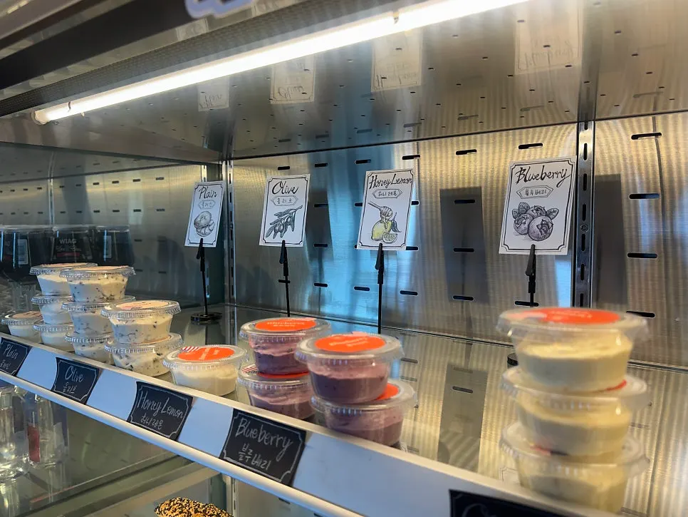 Refrigerated case with salmon sandwich and jambon-beurre